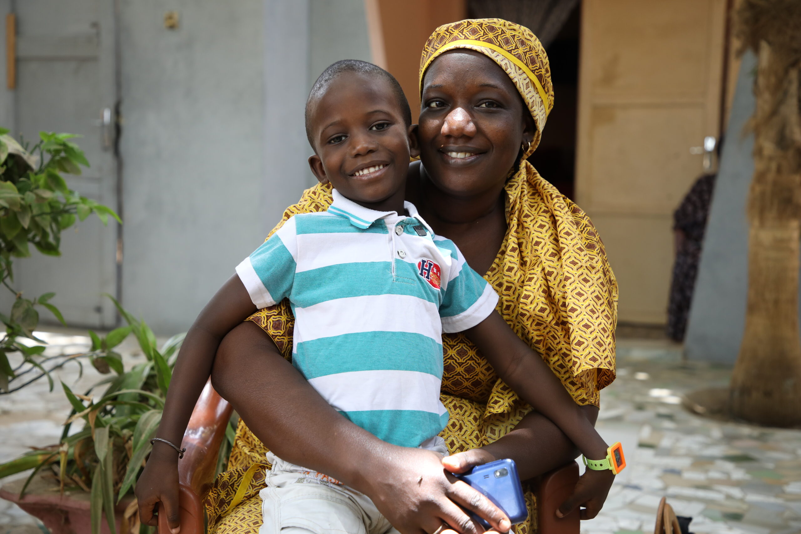 Babacar, who received VAS in Senegal with support from Helen Keller Intl, and his mother, Salivate. Courtesy of Helen Keller Intl (Senegal)